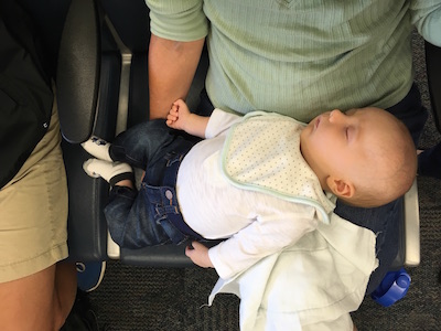 Sleeping baby at an airport